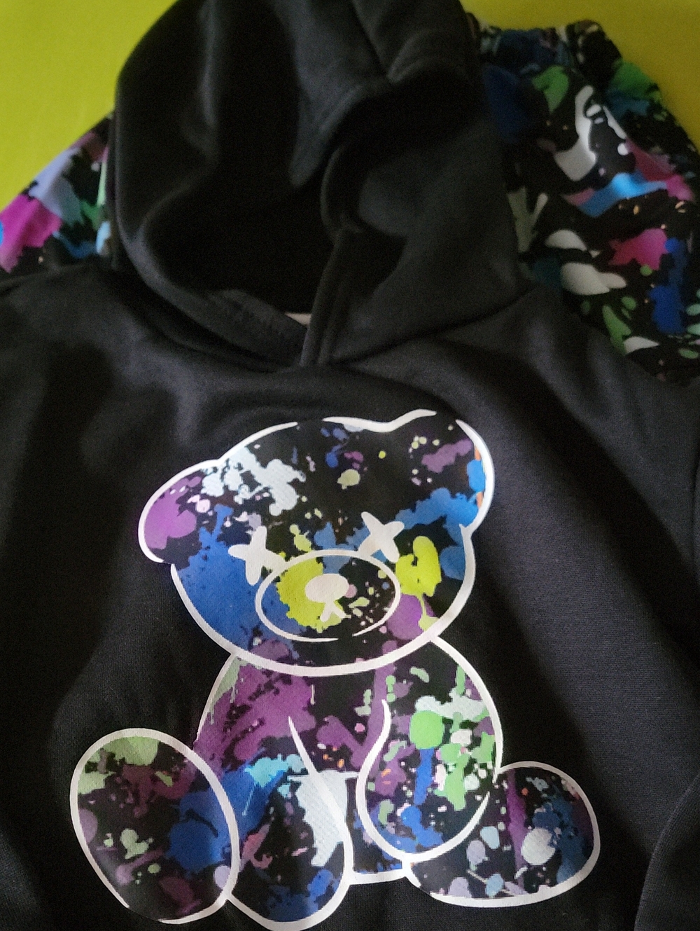 Kids Black Hoodie with Colorful Splatter Teddy Graphic